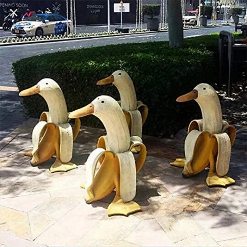Vivolux | Bananen-Enten-Skulptur | Verspielte Gartendekoration!