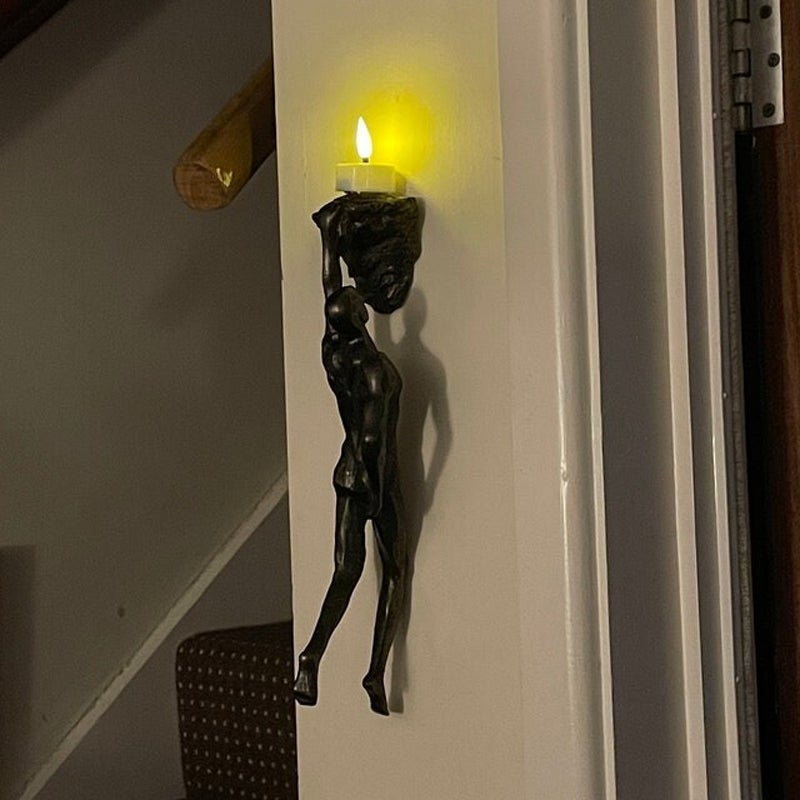 Vivolux | Kletterwand hängende Statuen
