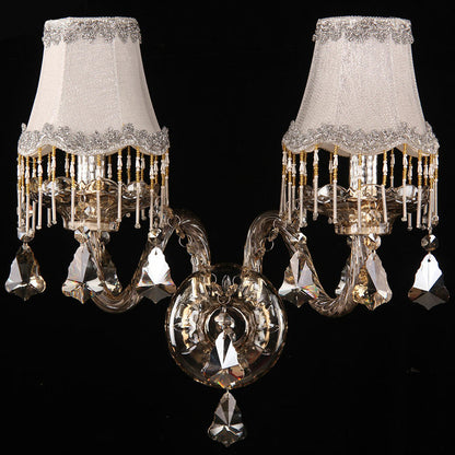 Vivolux | Gelaminateerde stoffen wandlamp armatuur antieke stijl 2-lamps slaapkamer wandstuk met franjes in amber