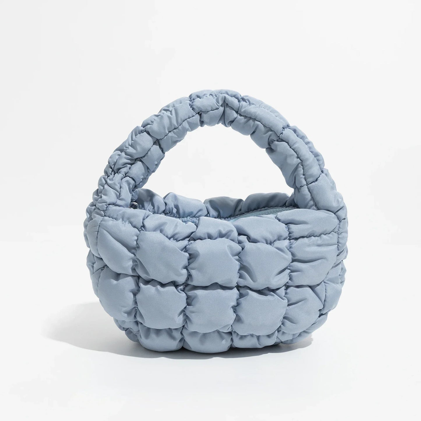 Vivolux | Lebhaftes kreuzgequiltetes rundes Mini-Tasche