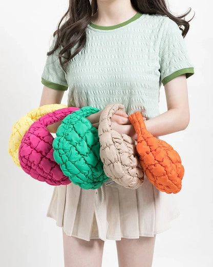 Vivolux | Lebhaftes kreuzgequiltetes rundes Mini-Tasche