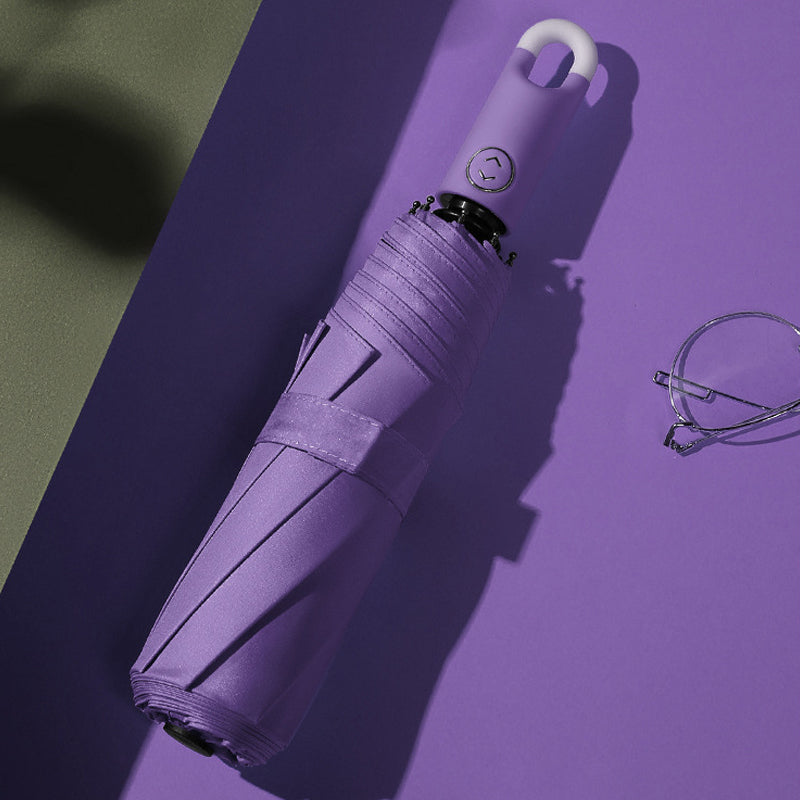 Dreifacher, selbstöffnender und einziehbarer Regenschirm mit Schnalle