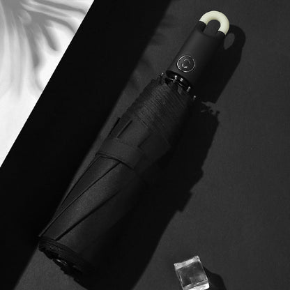 Dreifacher, selbstöffnender und einziehbarer Regenschirm mit Schnalle